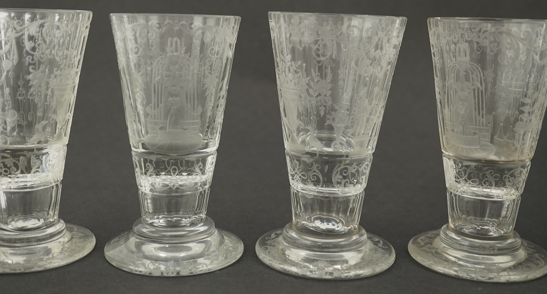 A set of six Lobmeyr engraved beakers, c.1880